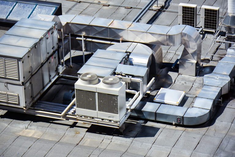 Heating and cooling service check in commercial warehouse